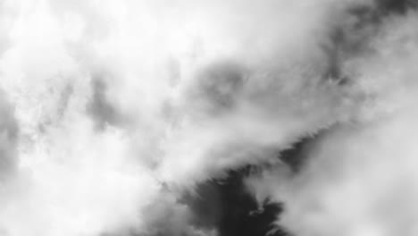 dark-clouds-behind-white-clouds-in-the-sky