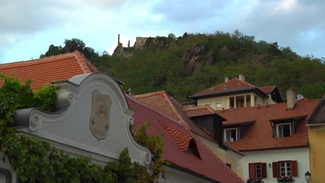 zoom in on durnstein castle ruins from a tiny town of durnstein on the banks of the danube