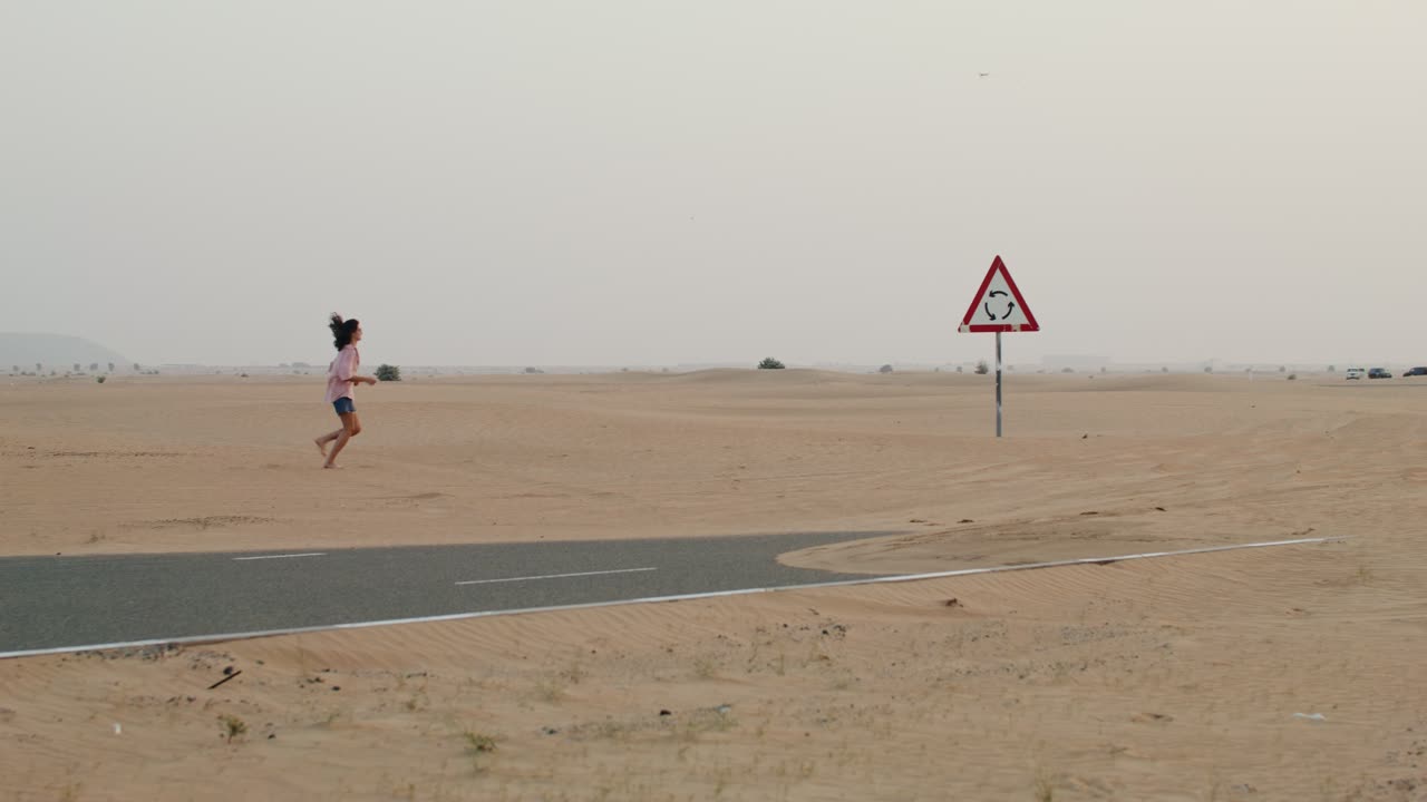 Woman Running in the Desert