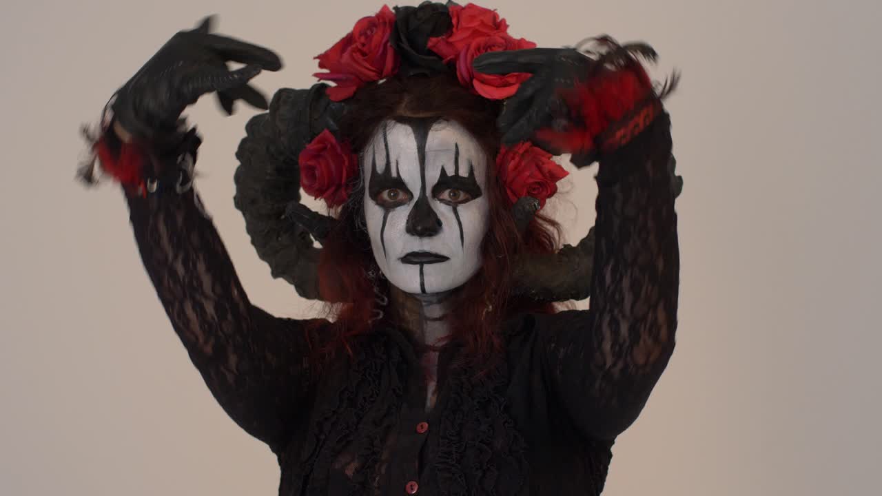 Catrina Cosplay girl seducing you with her eyes and hands in a Light background, Medium close up