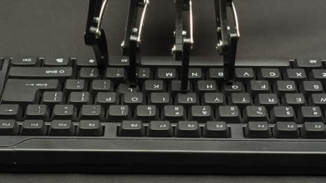 robot typing on keyboard