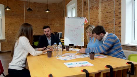 business team meeting involved diverse people participating in creative sustainable ideas steadicam shot across boardroom table shared work space