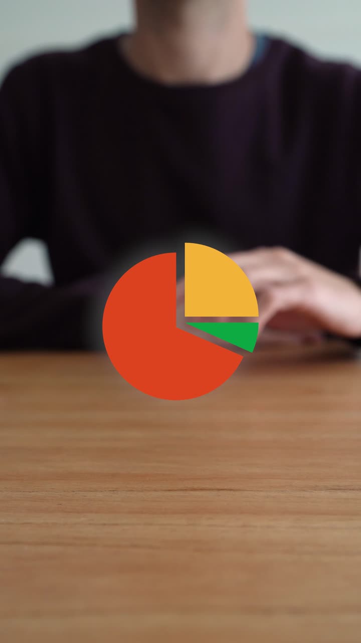 Persona tocca un grafico a torta digitale colorato, facendolo scomparire. Concetto di visualizzazione dei dati. Inquadratura verticale