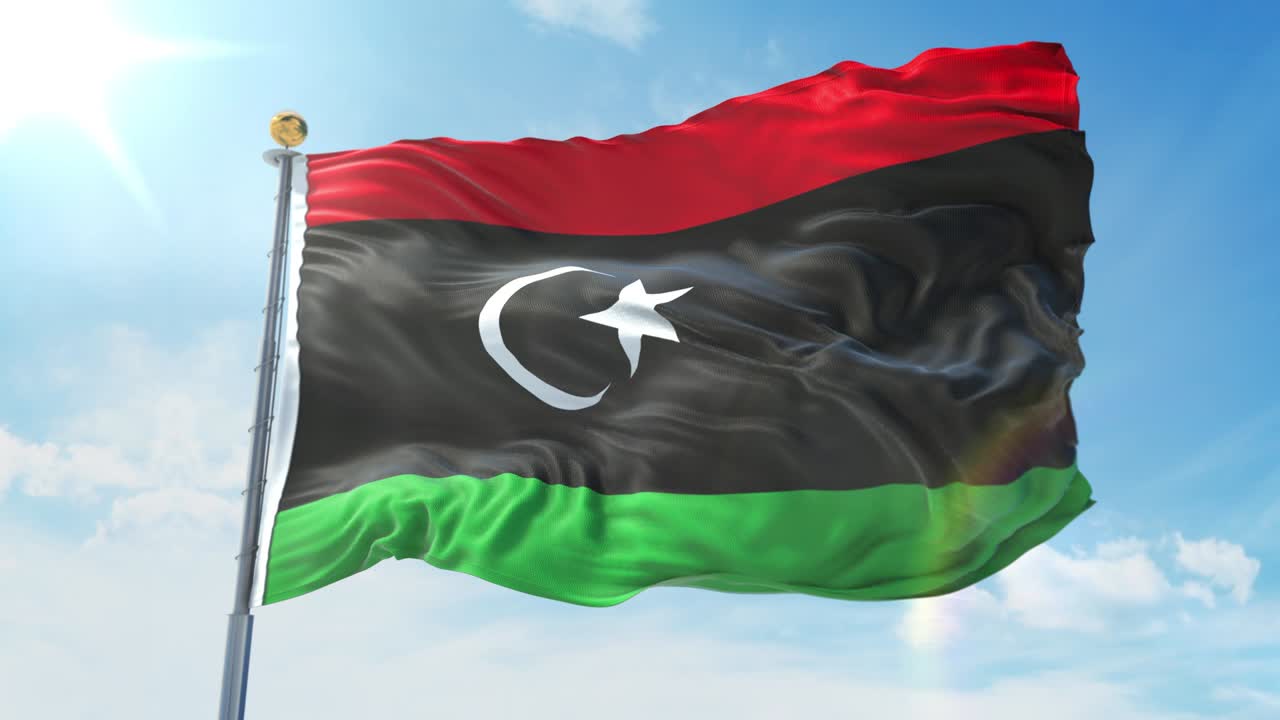 Libya flag waving in the wind against deep blue sky. National theme, international concept. 3D Render Seamless Loop 4K