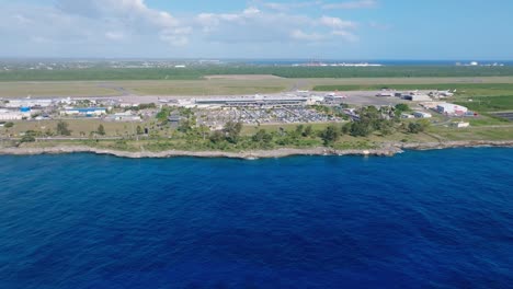 aerial view of las américas international airport from over caribbean