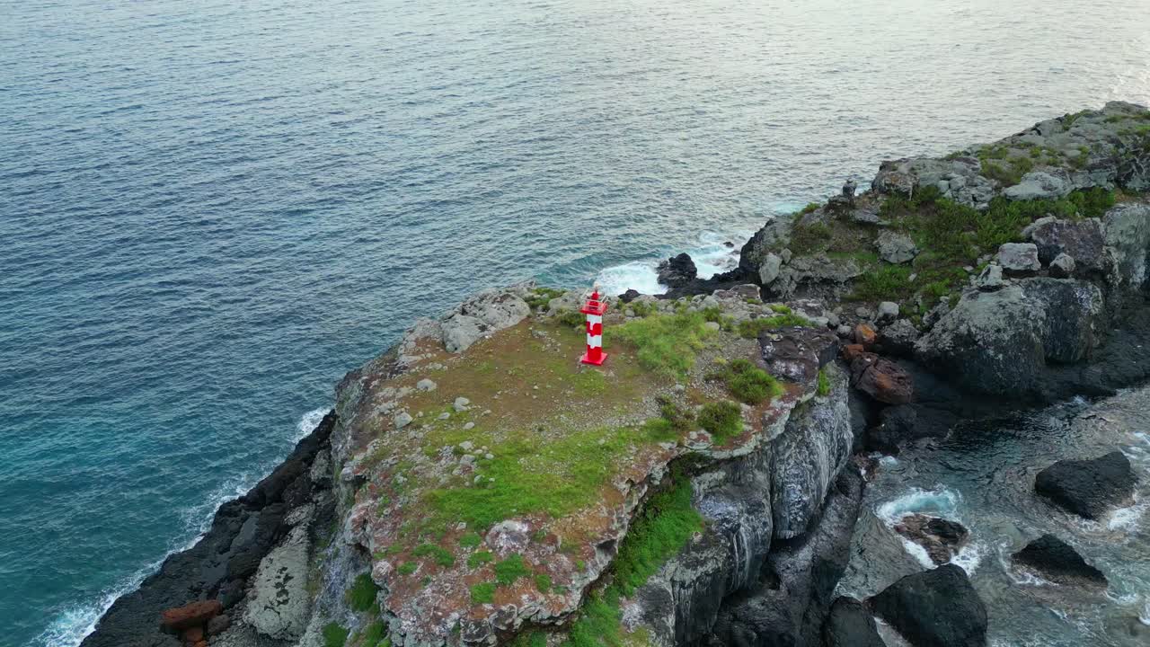 Aerial view of the monastery lighthouse located on a rock in front of Boi beach on the island of Principe,Sao Tome,Africa