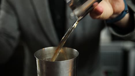 bartender preparing a cocktail