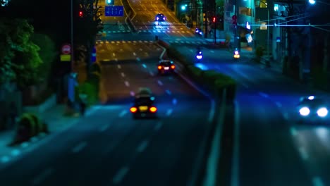 a night timelapse of the miniature traffic jam at the downtown street in tokyo