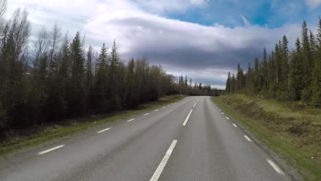 driving a car on a road in norway atlantic ocean road or the atlantic road (atlanterhavsveien) been awarded the title as (norwegian construction of the century).