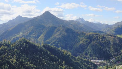 small town down the valley surrounded by mountains