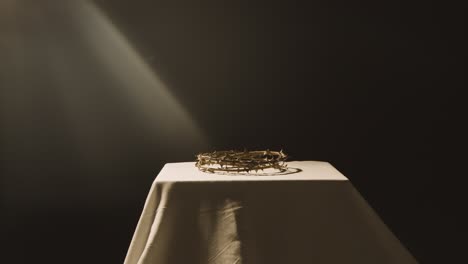 Religious-Concept-Shot-With-Crown-Of-Thorns-On-Altar-In-Pool-Of-Light-