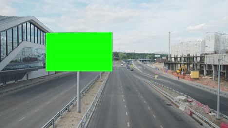green screen blank billboard on a busy street