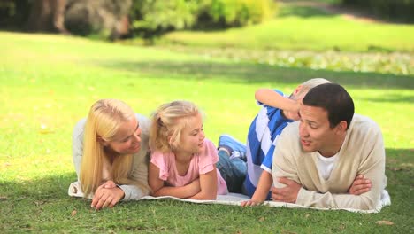 Young-couple-with-their-two-children