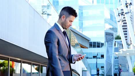 Businessman-using-mobile-phone