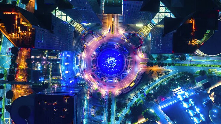 Aerial view Time lapse of the Fountain and Traffic in the Circle at night at Singapore