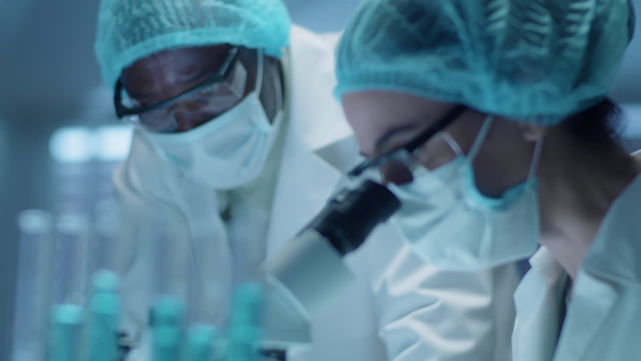 Scientists Conducting Laboratory Research Together