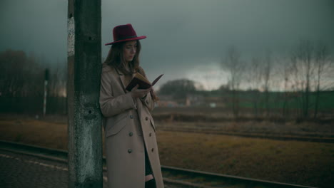 sad pensive woman reading book