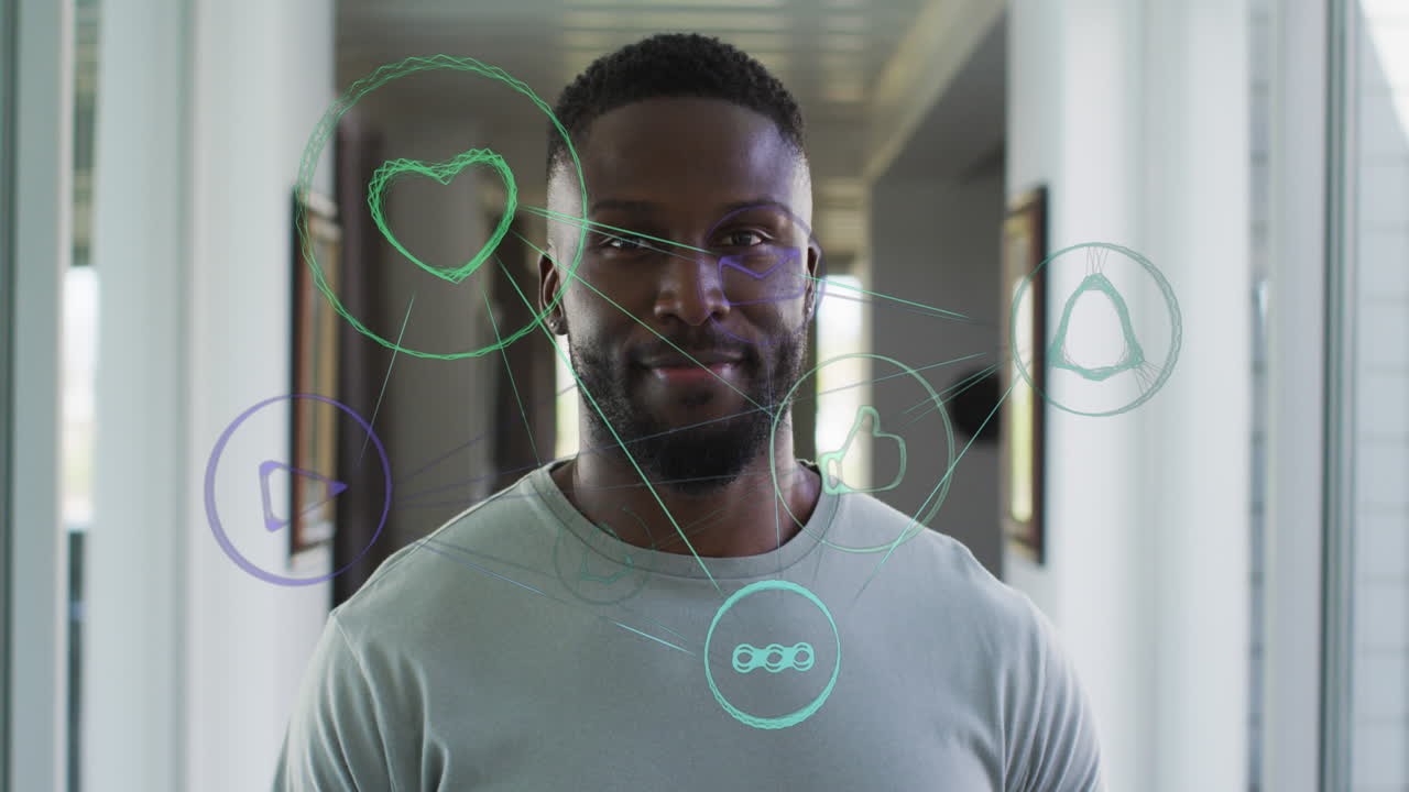 Animation of connections with icons over african american man smiling at camera