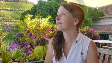 Portrait-Of-A-Woman-Eating-At-The-Alfresco-Dining-Near-Doura-Valley,-Portugal