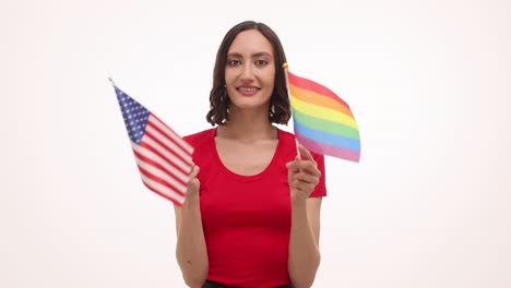 woman holding american and rainbow pride flags
