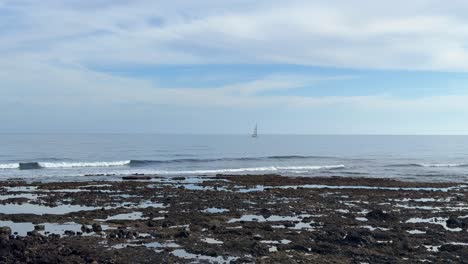 flux reflux retracted ocean shoreline rocky coast el medano tenerife ocean