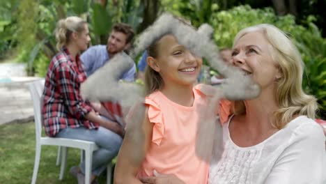 animation of smoke trails over caucasian family smiling