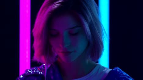 neon portrait of a woman with headphones
