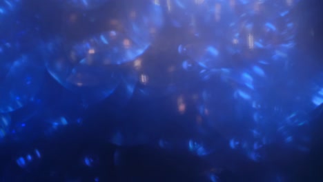 fondo desenfocado borroso. luces de neón de oro azul. fondo 4k en estilo cyberpunk o de alta tecnología del futuro. luces navideñas. parpadeo. fondo del día de san valentín