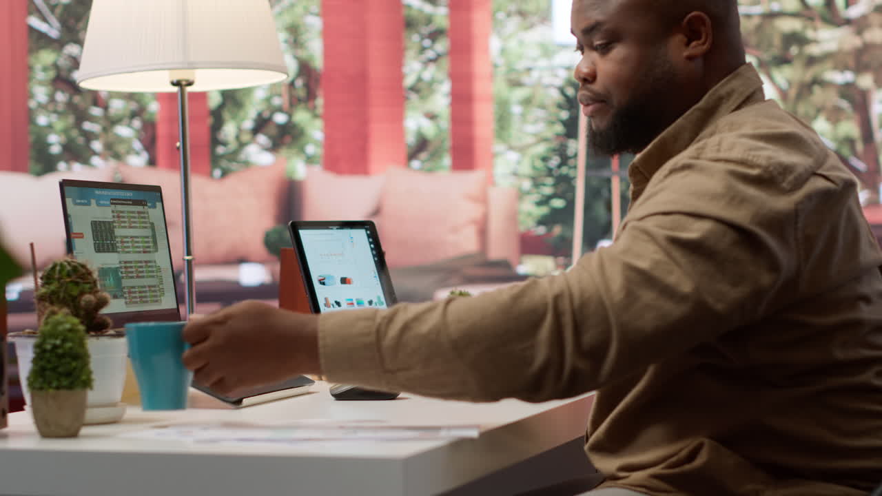 Entrepreneur falling asleep while he is calculating the annual sales reports