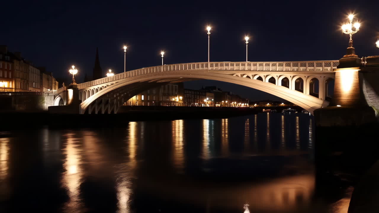Illuminated Bridge and River at Night