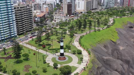 Aerial-Drone-Footage-at-the-Lighthouse-of-the-marina-in-the-district-of-Miraflores-Lima-Peru