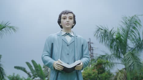 various statues in the park inside bandel church