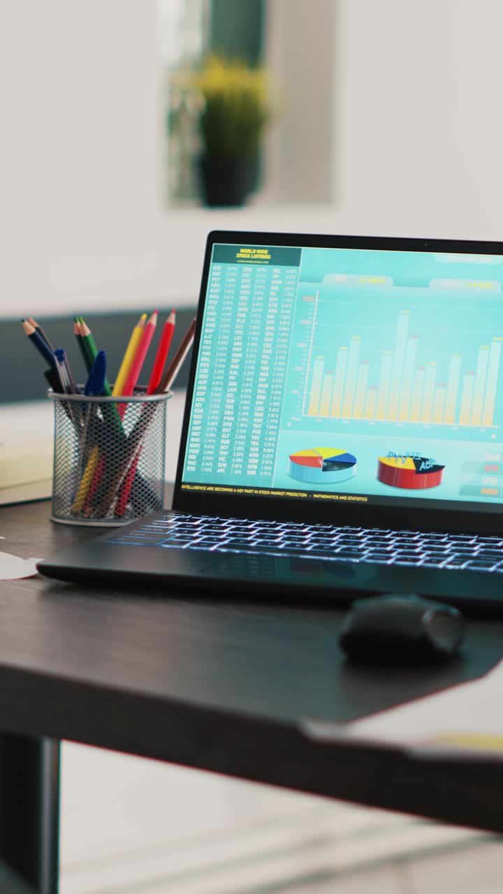Vertical video Financial stock market diagrams with charts and stock numbers on laptop showing profits