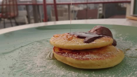 fluffy pancakes with maple syrup