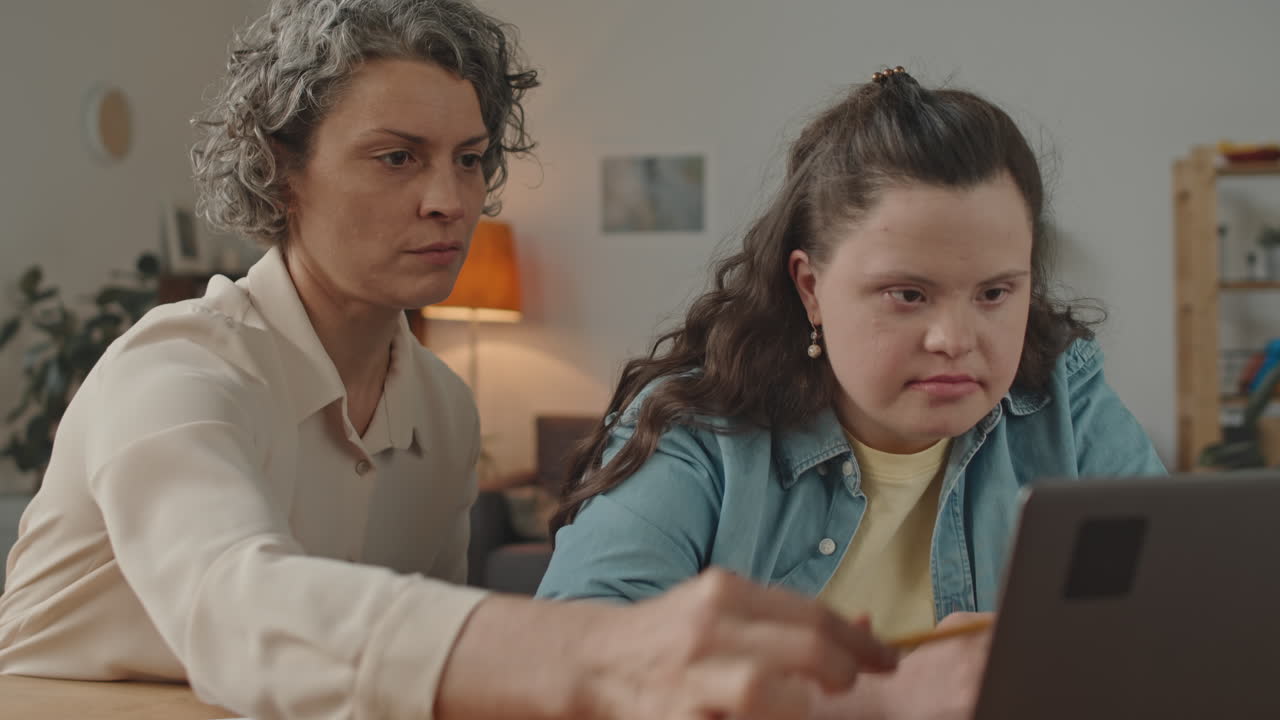 Tutoring session with a woman with down syndrome