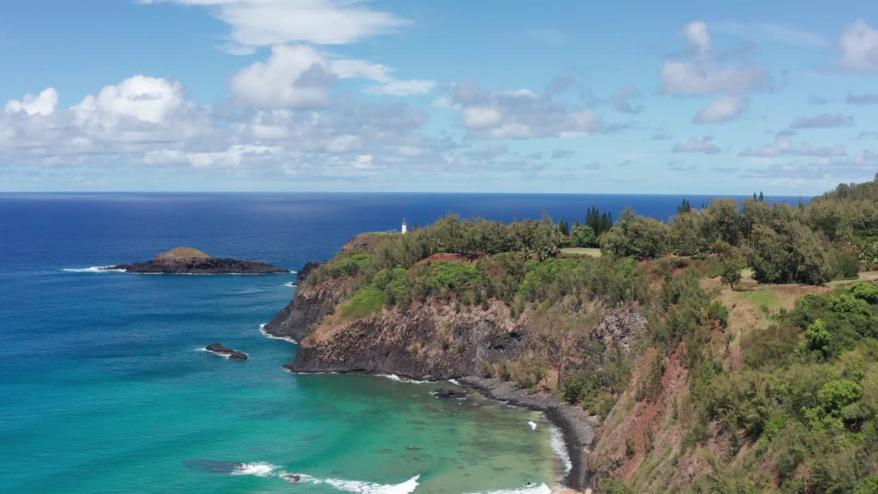 Aerial rising shot flying over the rugged northern coastline of Kaua'i at Kilauea Point in Hawai'i