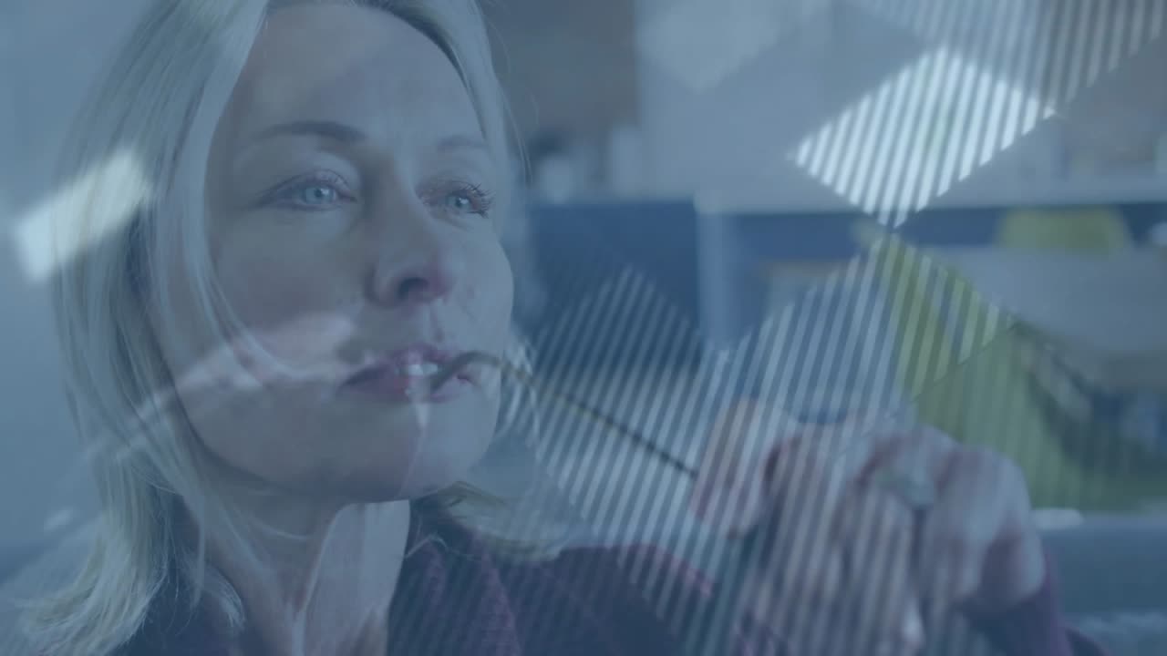 Mature woman lifting glasses while light shifts presenting holographic world map for data analysis