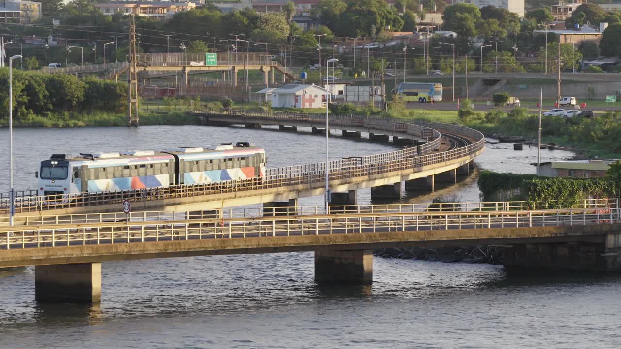 Scenic international train ride crossing the river between Posadas and Encarnación.