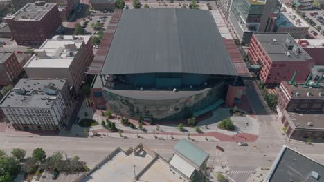 Van-Andel-Arena-in-Grand-Rapids,-Michigan-with-drone-video-pulling-back-and-tilting-up