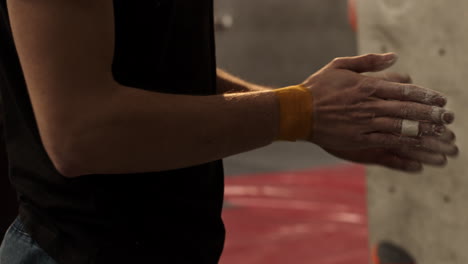 rock climber preparing hands