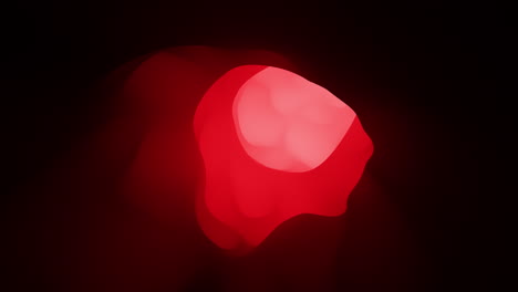 mesmerizing red light pierces through the darkness