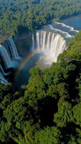 aerial view of iguazu falls with rainbow