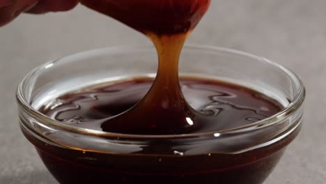 dipping chicken nuggets in sauce