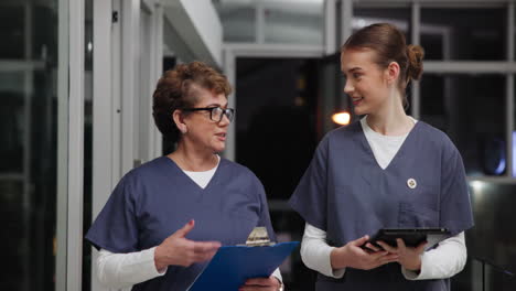 nurses discussing patient care