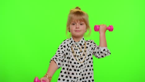 Sportive-kid-girl-working-out,-pumping-up-arm-muscles-lifting-pink-dumbbells,-practicing-pilates