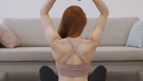 Woman Doing a Back Workout at Home