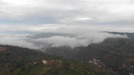 Drone-view-above-rural-road-at-cloudy-morning