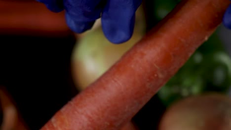 Close-up-of-carrot-being-peeled