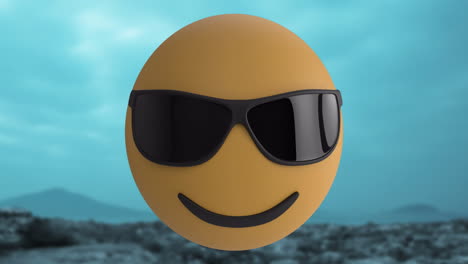 yellow 3d emoji face floating over rocky landscape, showcasing black wraparound sunglasses