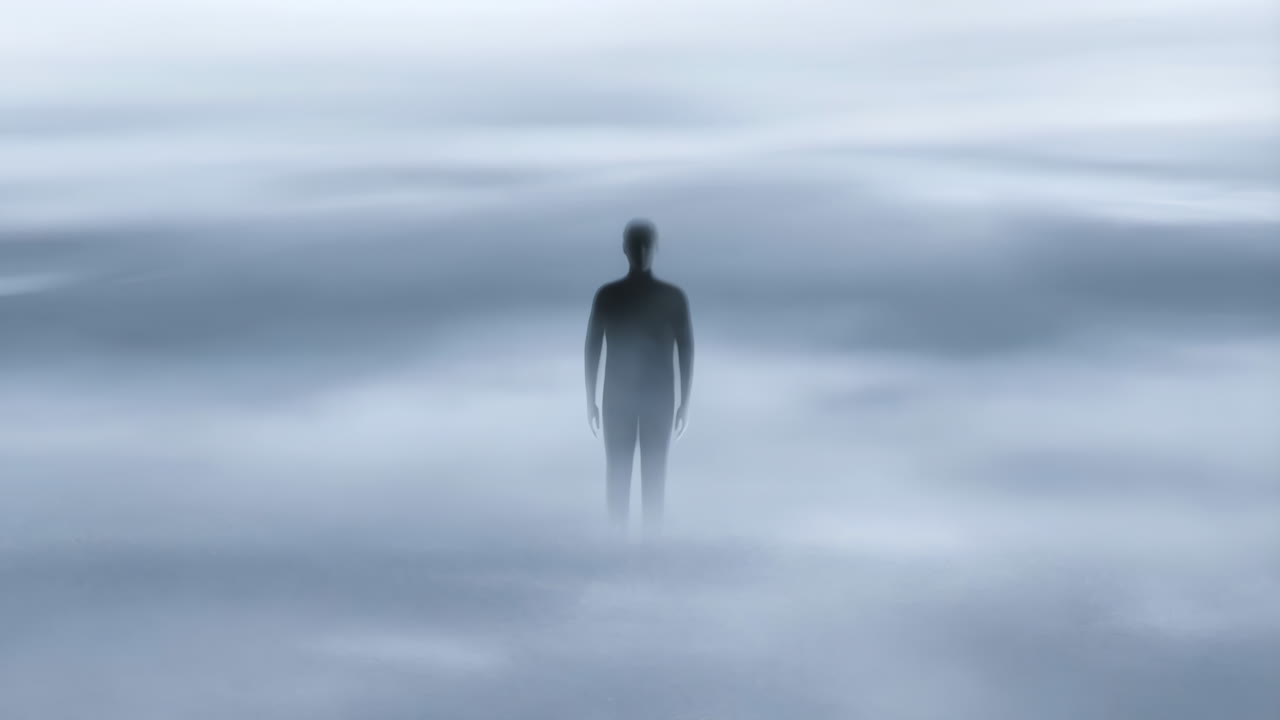 Silhouette of a Person Standing in Fog